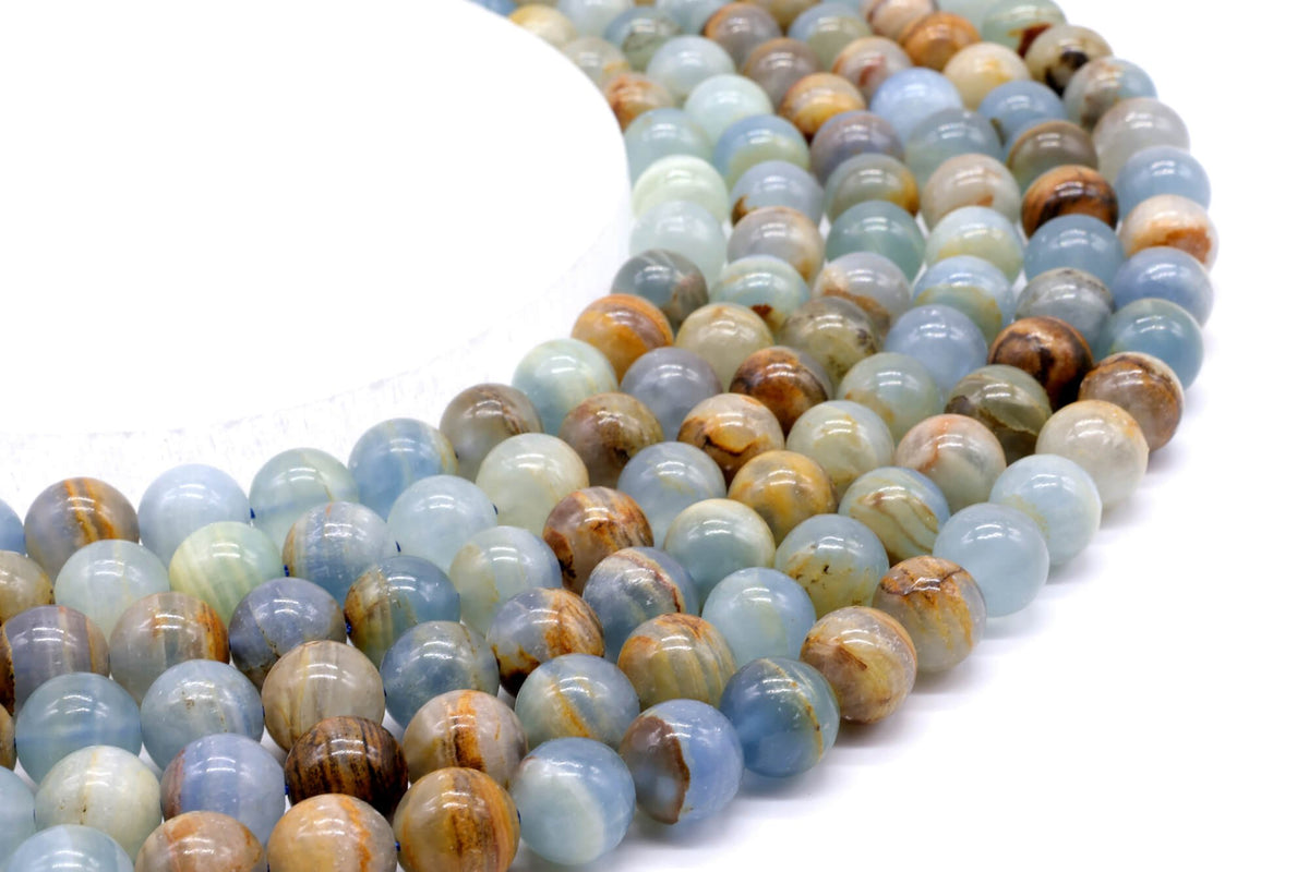 Perles Calcite Bleue 10mm sur fil 38cm