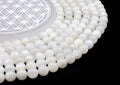 Perles de Lune Blanche 'AA' 10mm sur fil 38cm