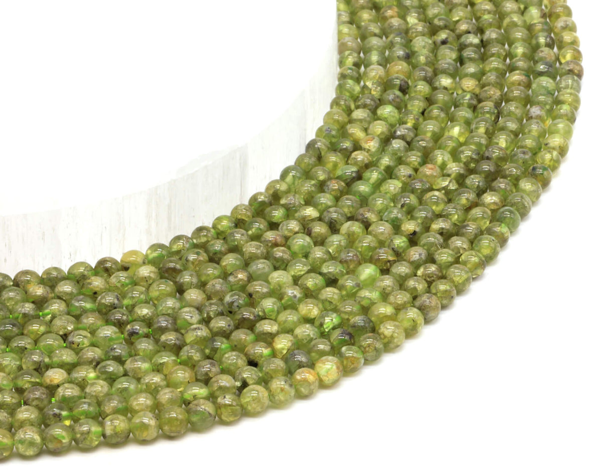 Perles Péridot 4mm sur fil 38cm