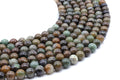 Perles Serpentine Chine 8mm sur fil 38cm