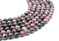 Perles 'Black Line' Rhodonite 10mm sur fil 38cm