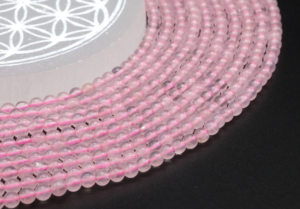 Perles Quartz Rose 4mm sur fil 38cm