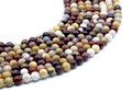 Perles Jaspe Mokaïte 6mm sur fil 38cm