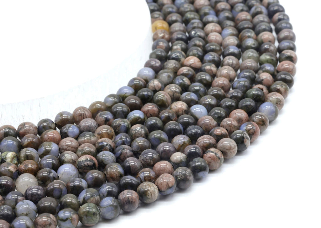 Perles Liberite 6mm sur fil 38cm