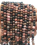 Perles 'Black Line' Rhodonite 4mm sur fil 38cm