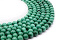 Perles 'Light' Malachite 'AA' 10mm sur fil 38cm