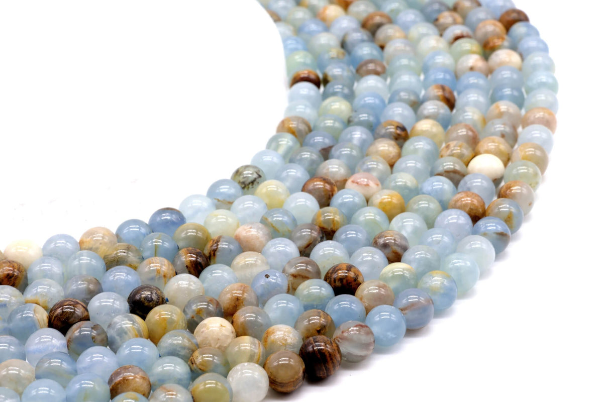Perles Calcite Bleue 6mm sur fil 38cm
