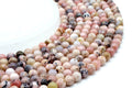 Perles Opale Rose 6mm sur fil 38cm