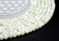 Perles Mother of Pearl 8mm sur fil 38cm