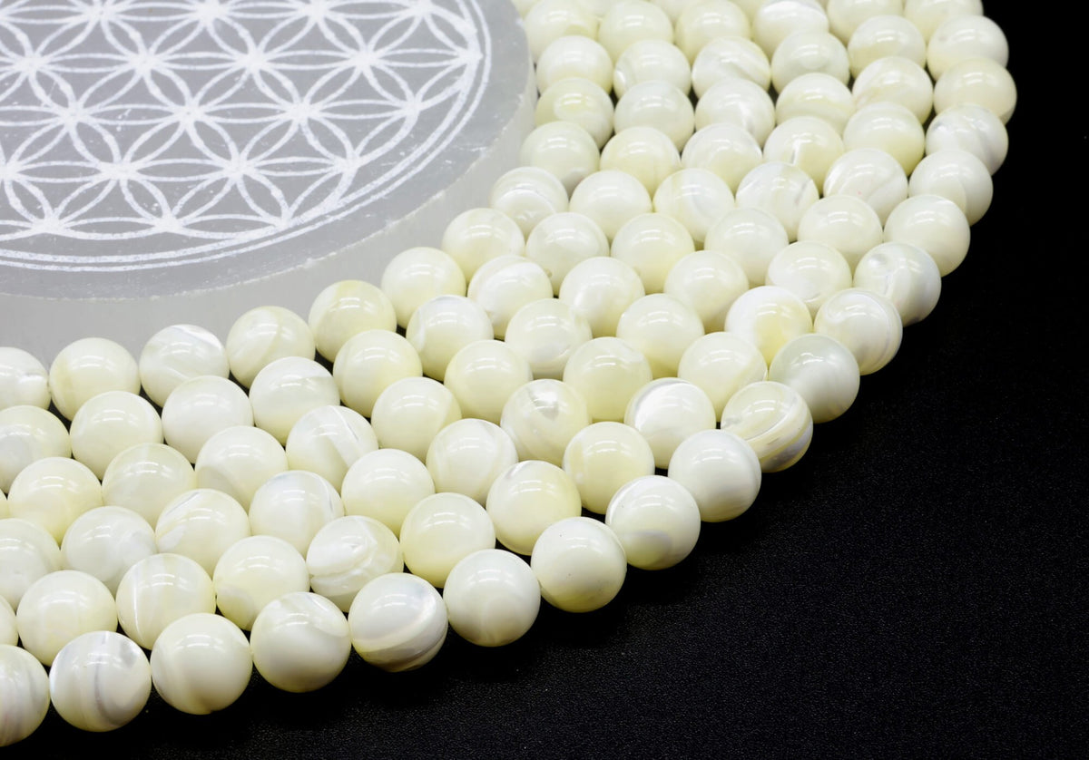 Perles Mother of Pearl 10mm sur fil 38cm