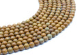Perles Bois Fossile 6mm sur fil 38cm