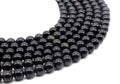 Perles Obsidienne Noire Dorée 10mm sur fil 38cm