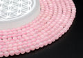 Perles Quartz Rose 6mm sur fil 38cm