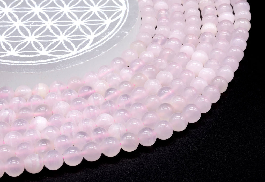 Perles Calcite Rose 8mm sur fil 38cm