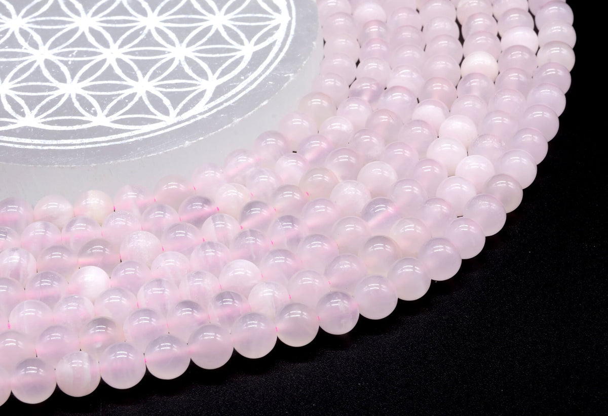 Perles Calcite Rose 8mm sur fil 38cm