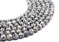 Perles Jaspe Dalmatien 10mm sur fil 38cm