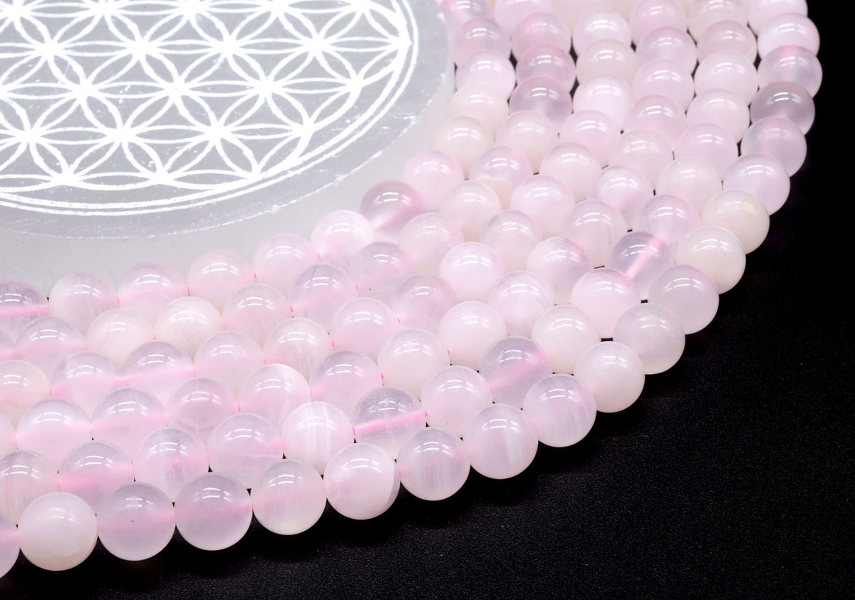 Perles Calcite Rose 10mm sur fil 38cm