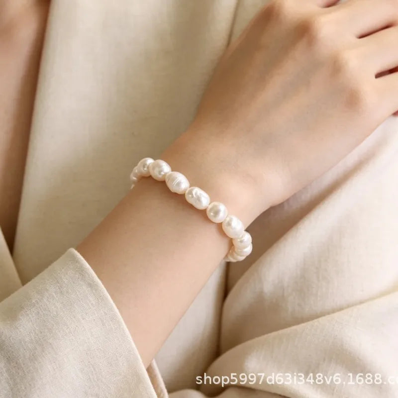 * Bracelet en Véritable Perles d'Eau Douce Cordon Elastique Style Doux et Elegant