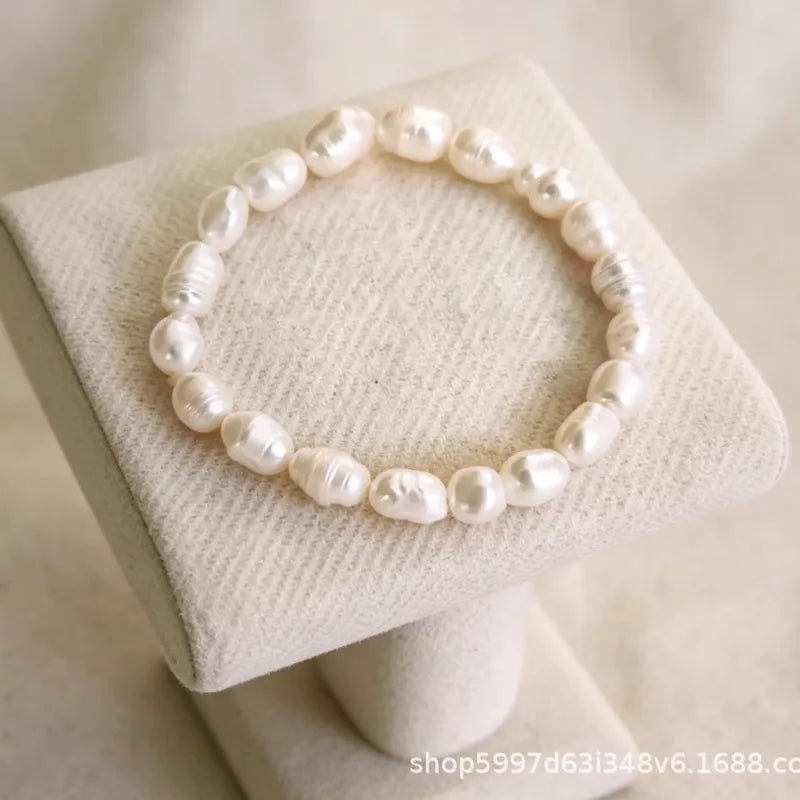 * Bracelet en Véritable Perles d'Eau Douce Cordon Elastique Style Doux et Elegant