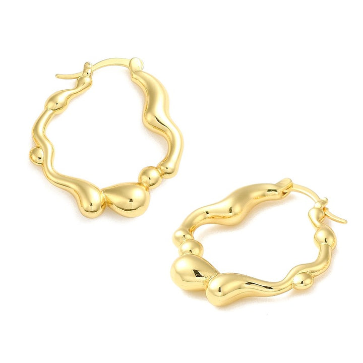 Créoles Dorées à l'Or Fin 30×25 mm – Le Classique Incontournable