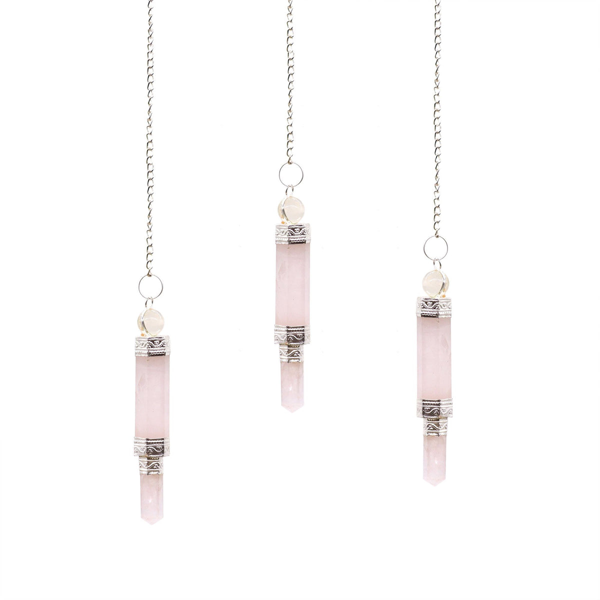 Pendule en quartz rose à trois éléments