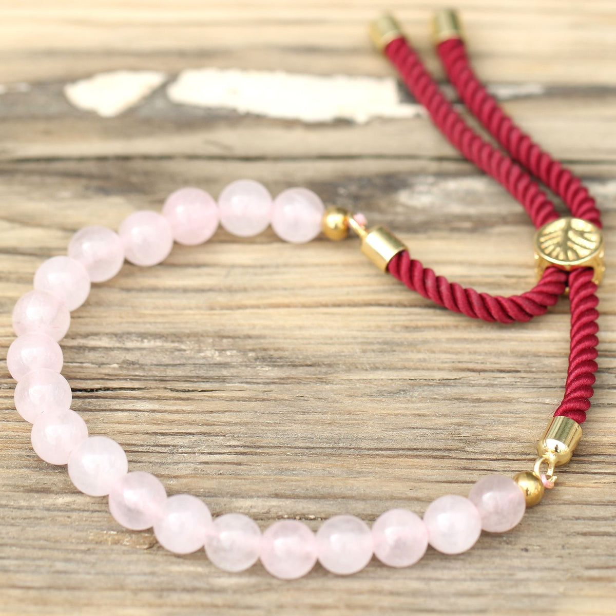 Bracelet cordon bordeaux en quartz rose, fermoir plaqué or 18 carats