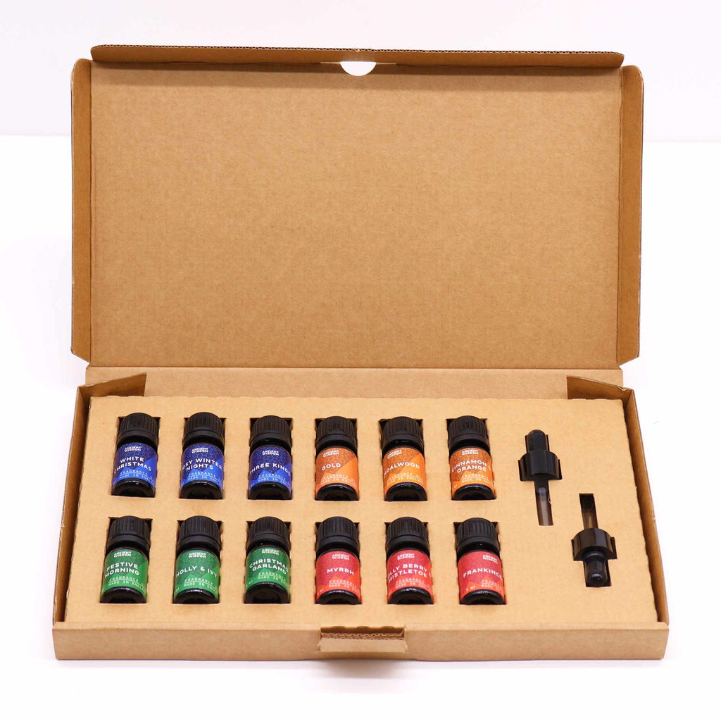 * Coffret d’huiles parfumées Senteurs sacrées de Noël – 12 × 5 ml