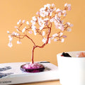Grand arbre en quartz rose sur socle d’agate rose, 100 pierres