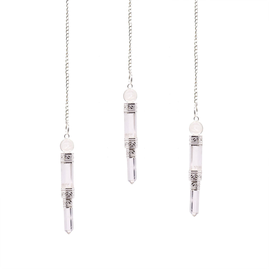 * Pendule en trois parties en cristal de roche