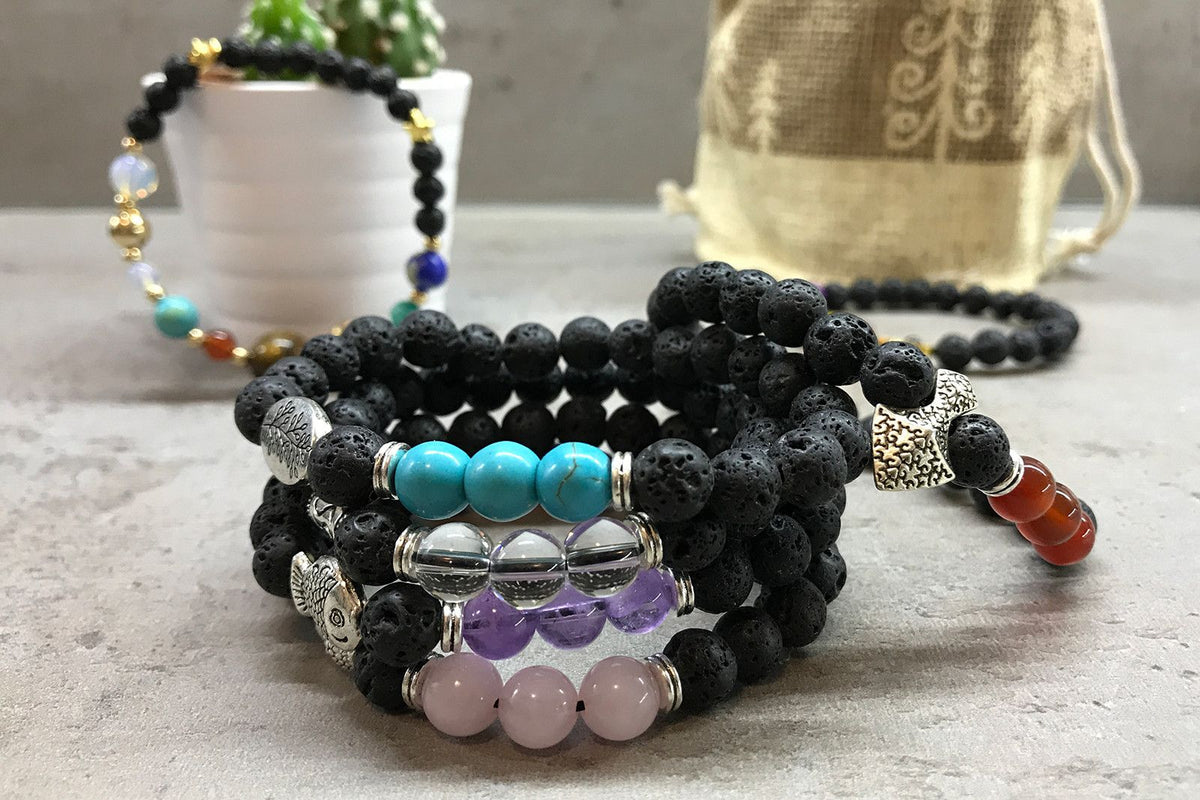 Bracelet en pierre de lave – poisson en améthyste
