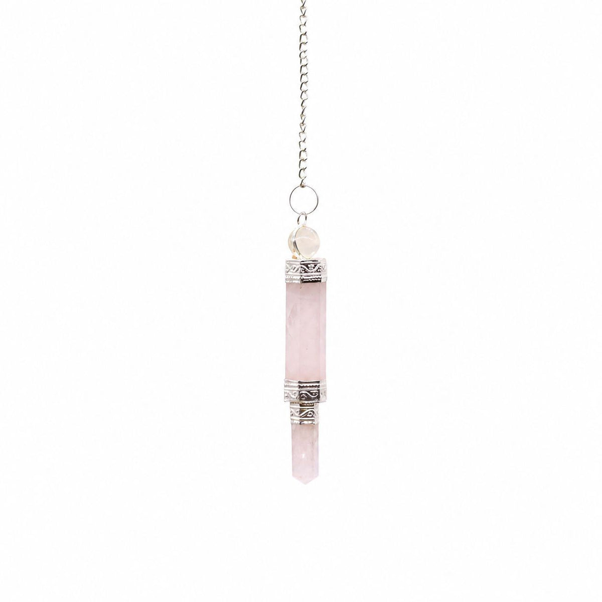 Pendule en quartz rose à trois éléments