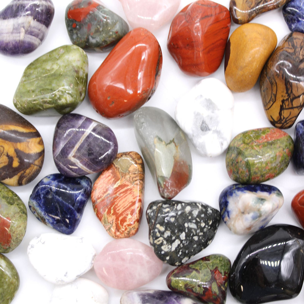 Sachet de 12 pierres roulées africaines en quartz rose, taille moyenne