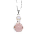 Pendentif « mains guérisseuses » en quartz rose