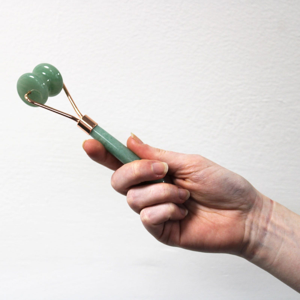 Mini rouleau facial en améthyste